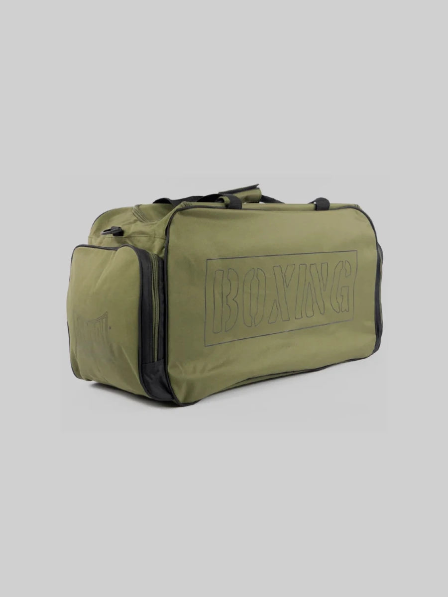 Vue latérale du sac Metal Boxe Club avec détail des poches accessoires