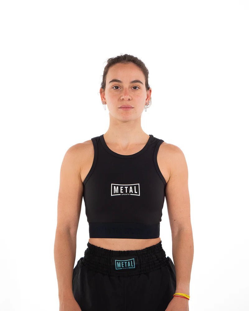 Framifrån av det svarta Metal Boxe Donna kompressionslinnen med full täckning över magen och bröstet