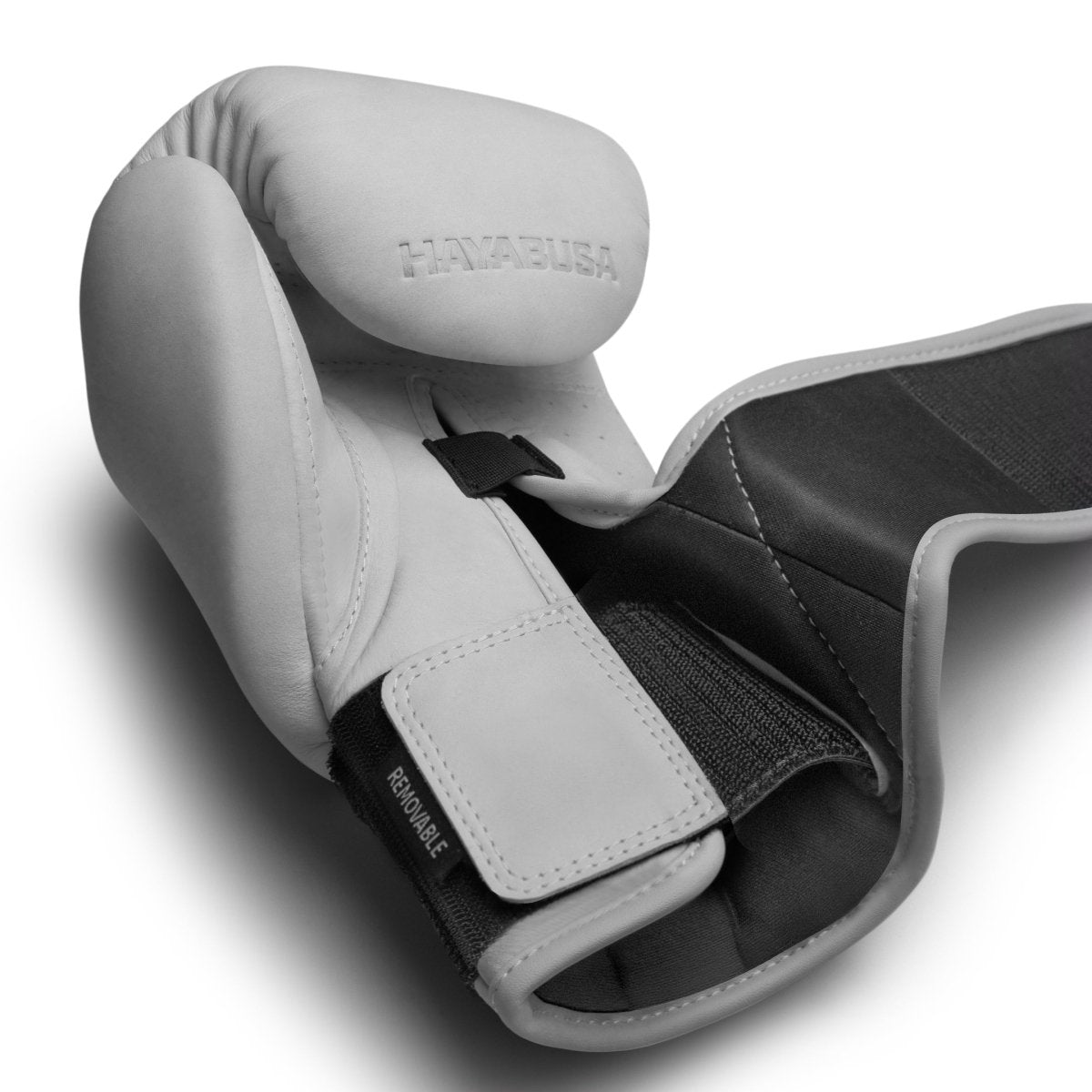 Witte Hayabusa T360 enkele handschoen, detail van het drievoudige spalksysteem voor polsstabilisatie