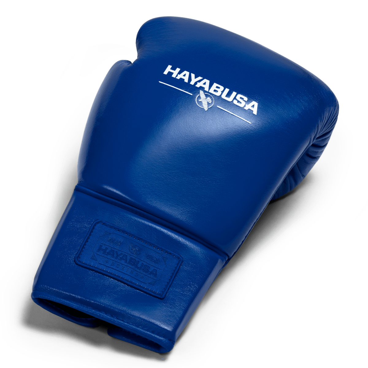 Bovenaanzicht van een enkele kobaltblauwe Hayabusa Pro Lace-bokshandschoen, met de vulling en het volnerf leer