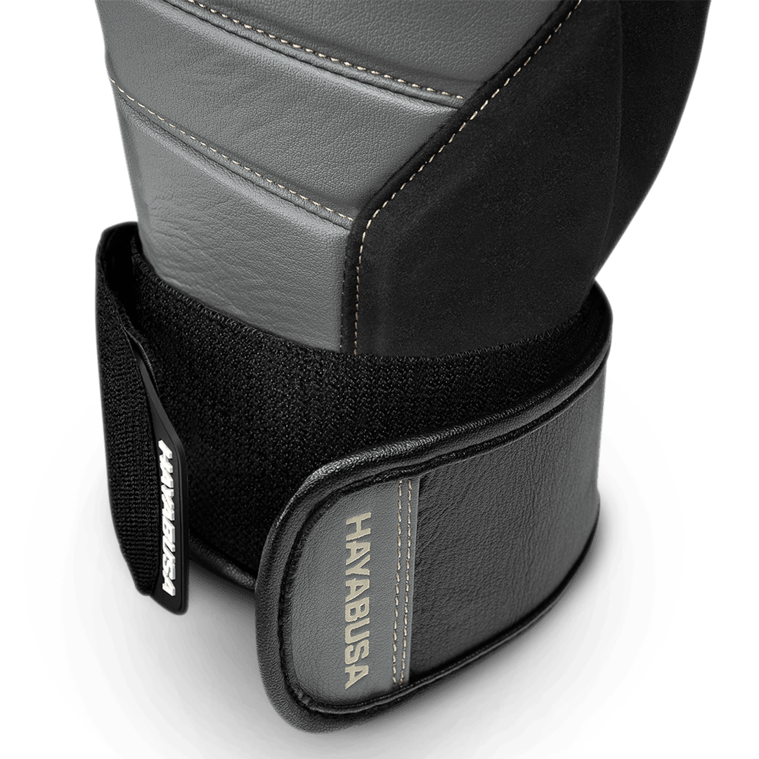 Detail van het polssteunsysteem van de grijs/zwarte handschoenen