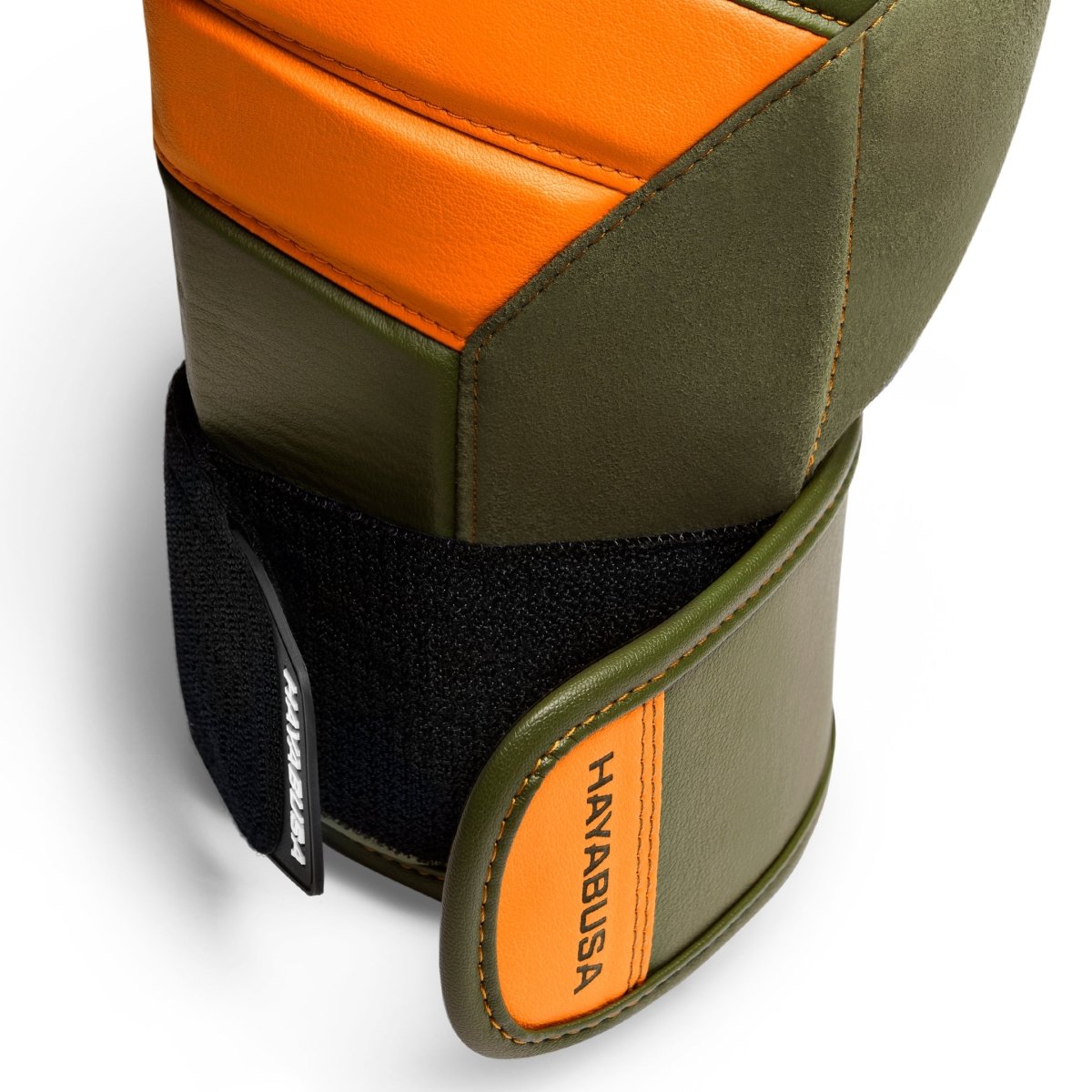 Detail van de verstevigde sluiting van de groen/oranje handschoenen.