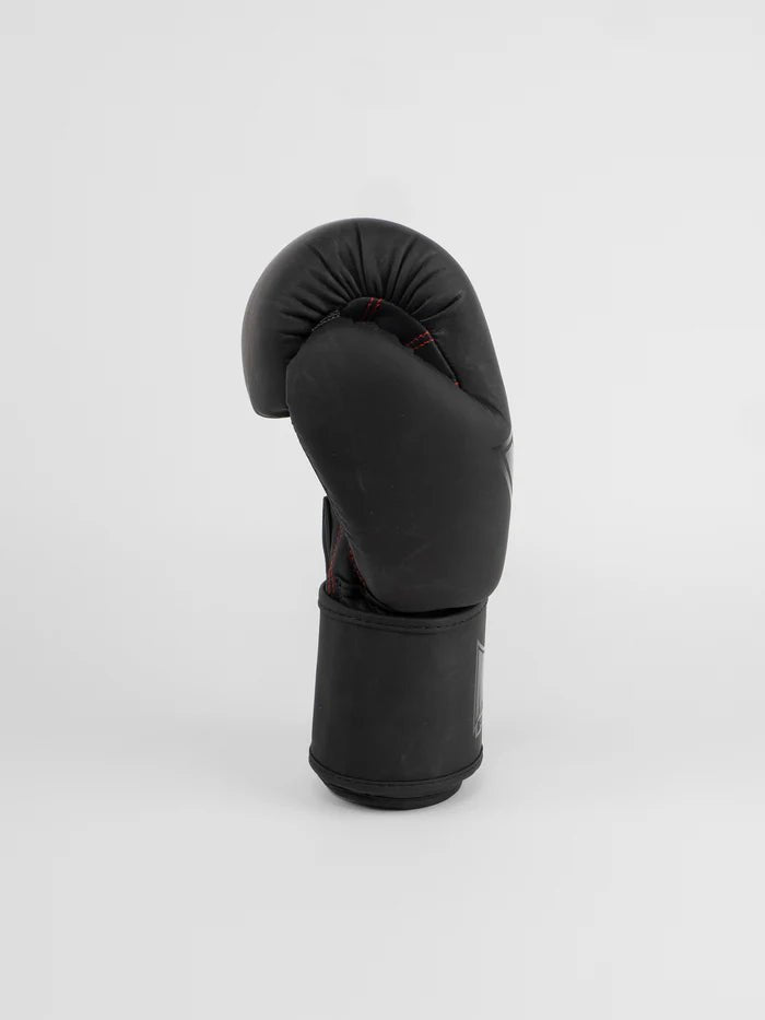 Vue latérale des gants de boxe Muay Thai Metal, fermeture velcro et finition mate
