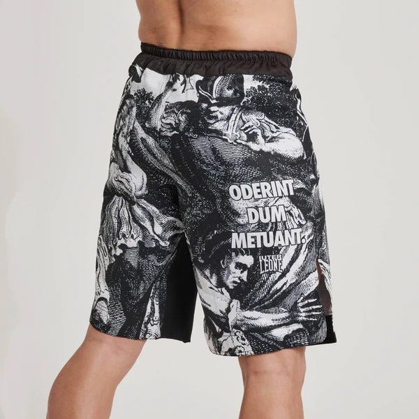 Achterdetail van de zwarte tailleband van de LEONE x IUTER MMA-shorts, met een duidelijk zicht op het achterste middenpaneel