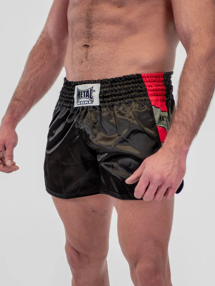 Huvudvy framifrån Herrburna svarta metallboxningsshorts Kick Pro Kickboxningsshorts