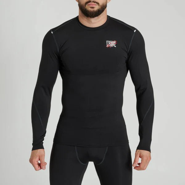 Vooraanzicht van de zwarte Leone Primal Instinct rashguard met lange mouwen