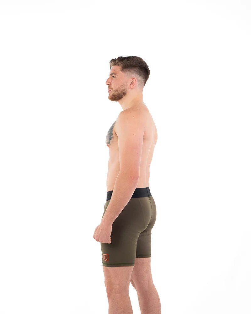 Kompressionsshorts för män bakifrån Metal Boxe grönt ultraflex tyg