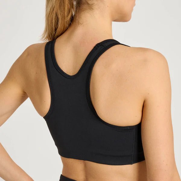 Vue arrière du soutien-gorge technique noir Leone Logo montrant la coupe sportive