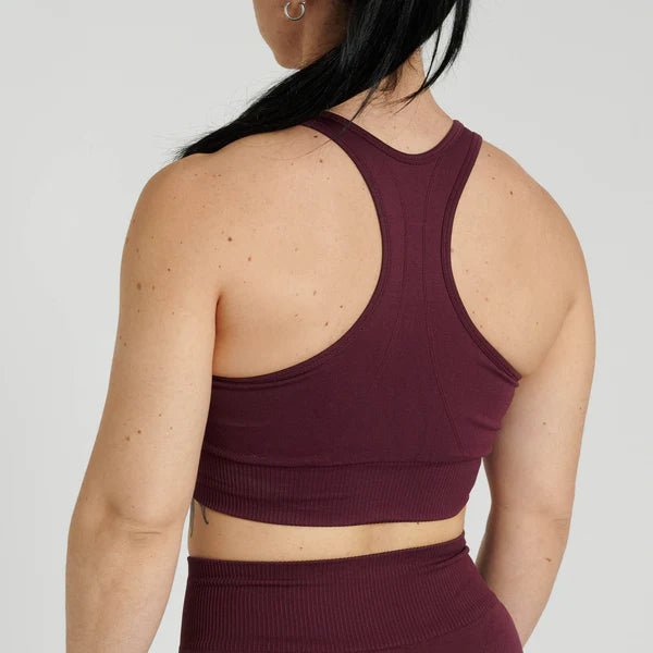 Vue arrière du soutien-gorge technique aubergine sans couture