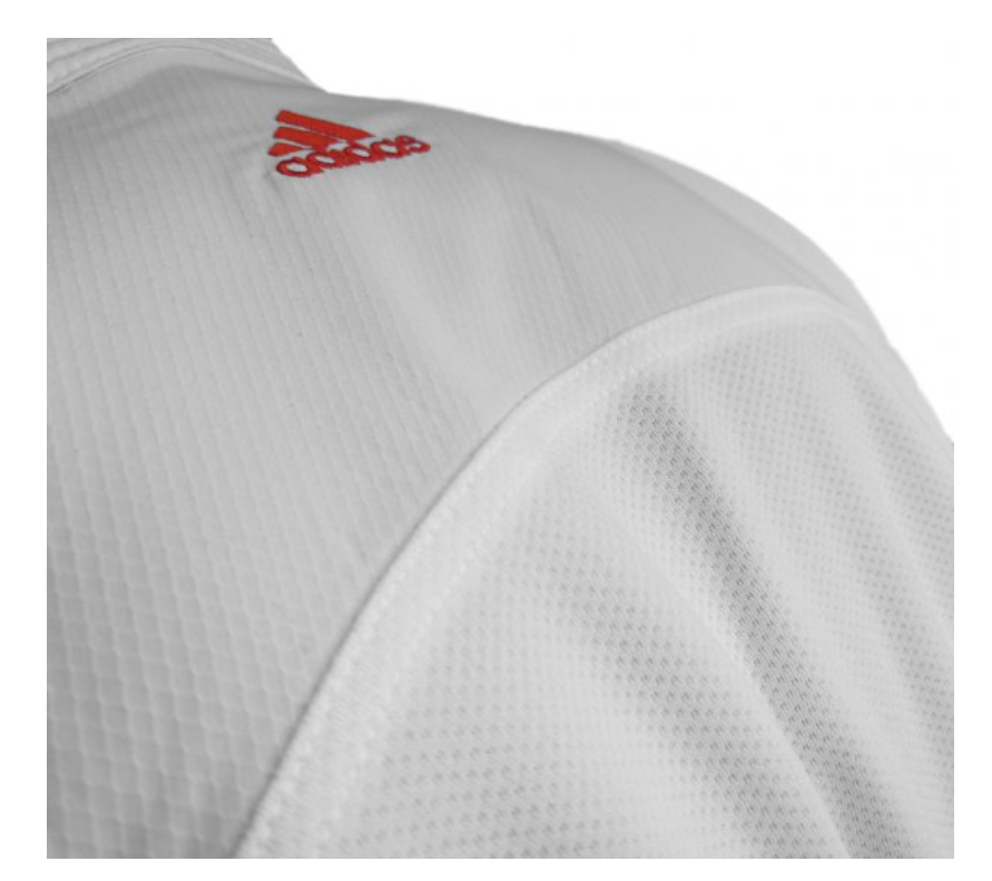 Karategi Adidas Adlight Primegreen con strisce rosse