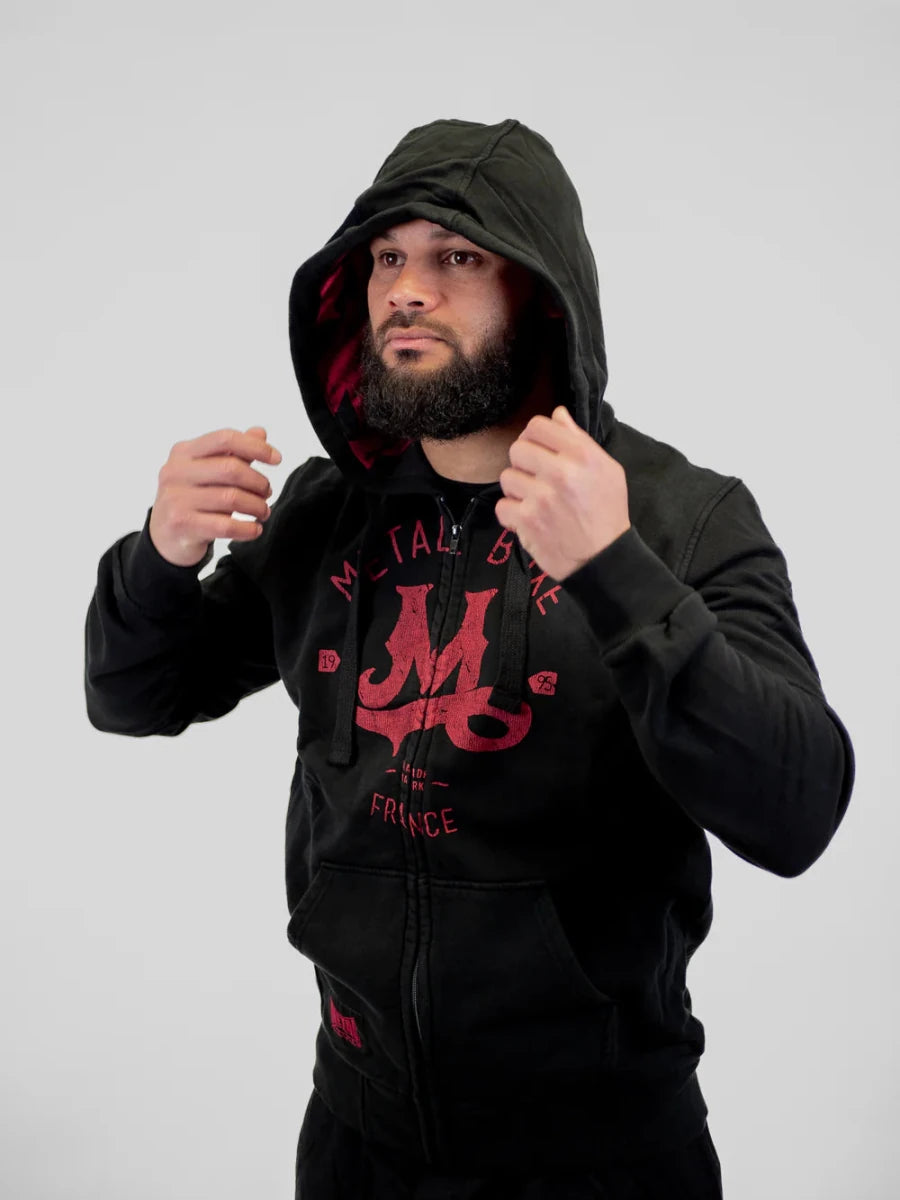 Detail van de capuchon en katoenen stof van het professionele Metal Boxe-sweatshirt