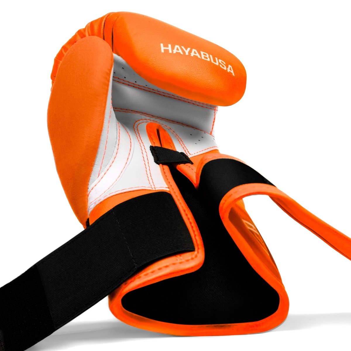 Binnenkant van de open klittenbandsluiting van de neon oranje handschoenen