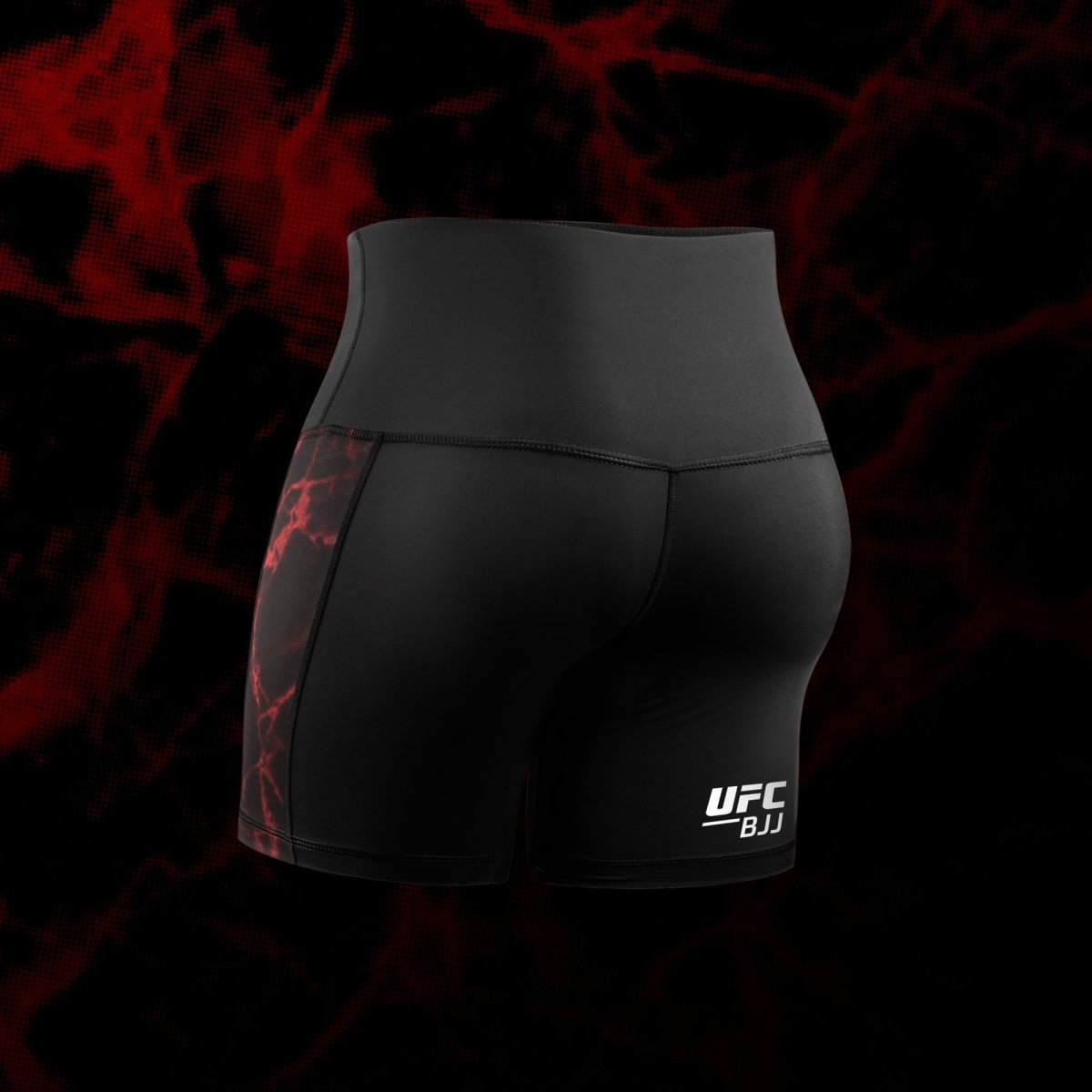 Bakifrån av de svarta och röda Vale Tudo UFC damshorts, kompressionssnitt